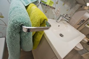 Towel rail close up exhibit by Ocean Bathrooms By Design showroom picture in Salisbury Wiltshire