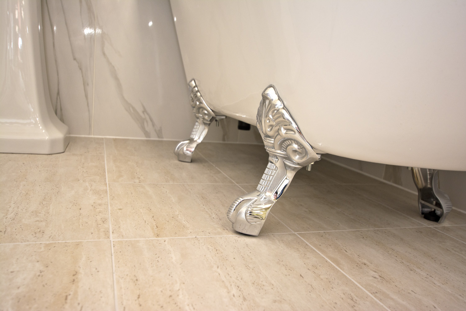 Traditional Bathroom lions claw metal leg bath pic from Ocean Bathrooms By Design in Salisbury