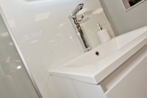 White units Display by Ocean Bathrooms By Design showroom picture in Salisbury Wiltshire