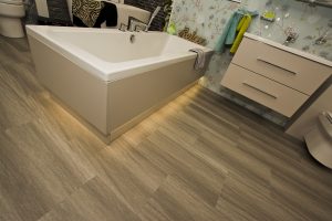 Cream bath panel exhibit 2 by Ocean Bathrooms By Design showroom picture in Salisbury Wiltshire