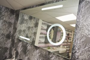 Mirror wall exhibit by Ocean Bathrooms By Design showroom picture in Salisbury Wiltshire