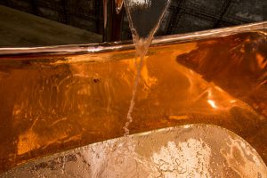 Water close up over Copper bath from Ocean Bathrooms By Design in Salisbury