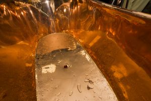 Water droplets inside Copper bath from Ocean Bathrooms By Design in Salisbury