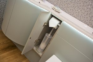 Contemporary bath unit with light under counter top from Ocean Bathrooms By Design in Salisbury
