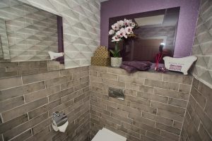 Toilet and tiled walls and basin display 4 by Ocean Bathrooms By Design in Salisbury