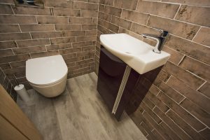 Toilet and tiled walls and basin display 3 by Ocean Bathrooms By Design in Salisbury